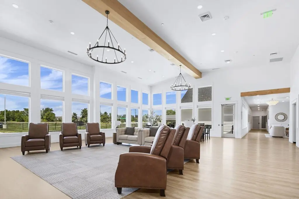 Great room with tall windows at The Ponderosa Estate luxury assisted living in Eagle Idaho